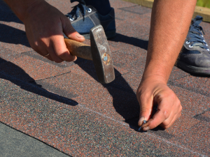 Professional winter roof maintenance by Farmington Roofing Service, H. Kulak & Son