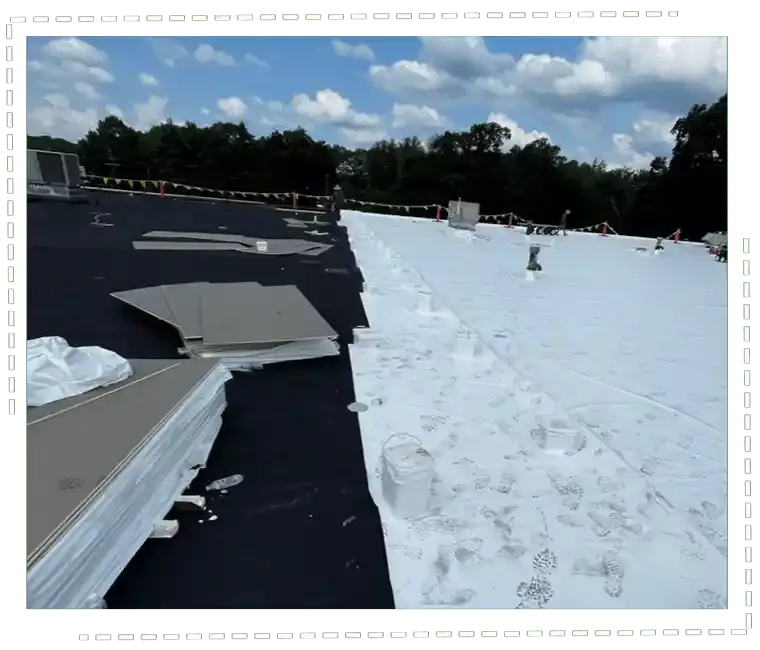 White commercial rooftop with single-ply membrane installed by H.Kulak & Son